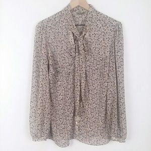 South floral semi sheer v neck with tie blouse